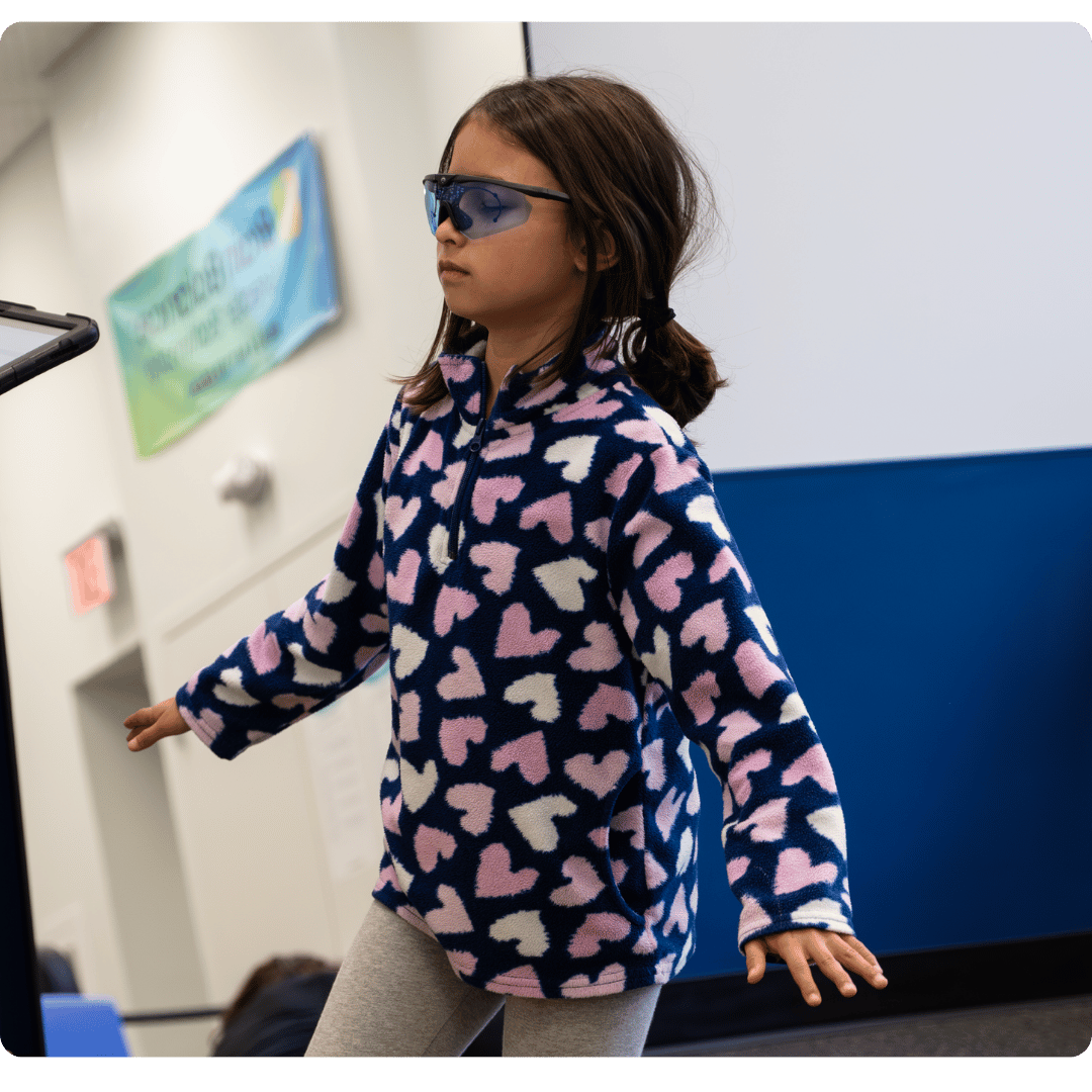 A Brain Balance student balancing.