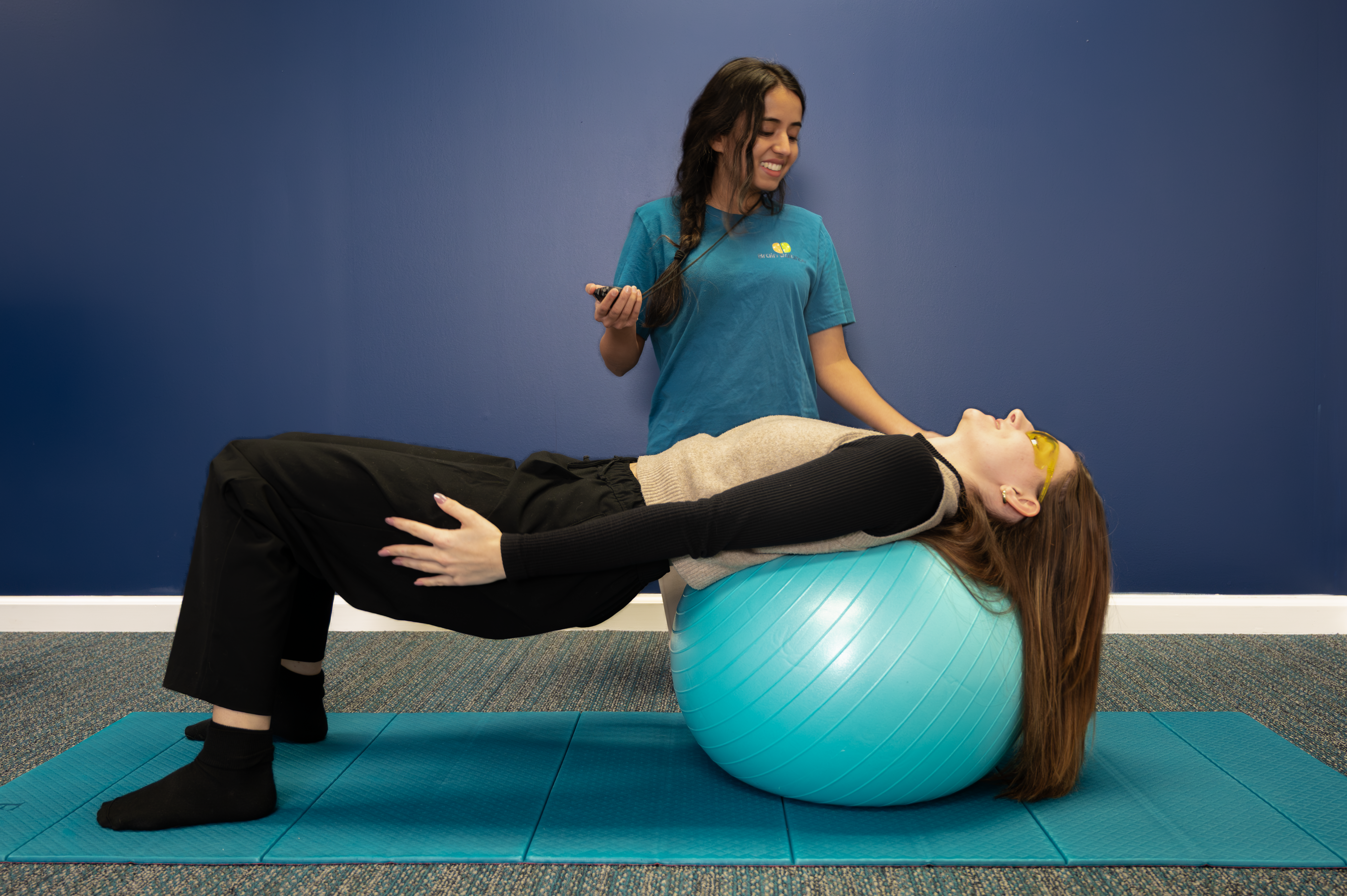 Person performing Brain Balance core exercises.